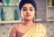 vj-mahalakshmi-golden-saree-standing-in-kitchen